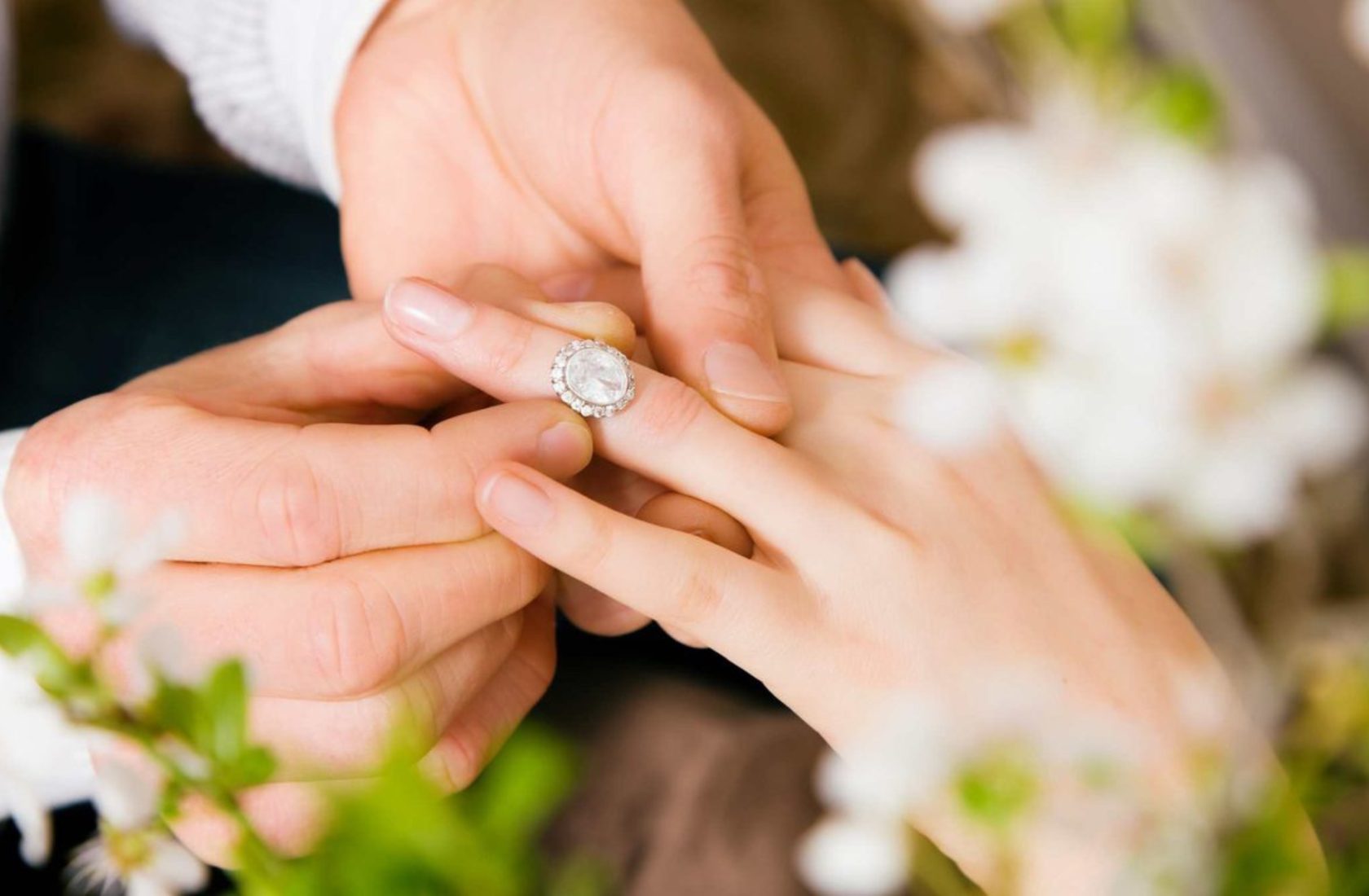 Couple exchanging rings